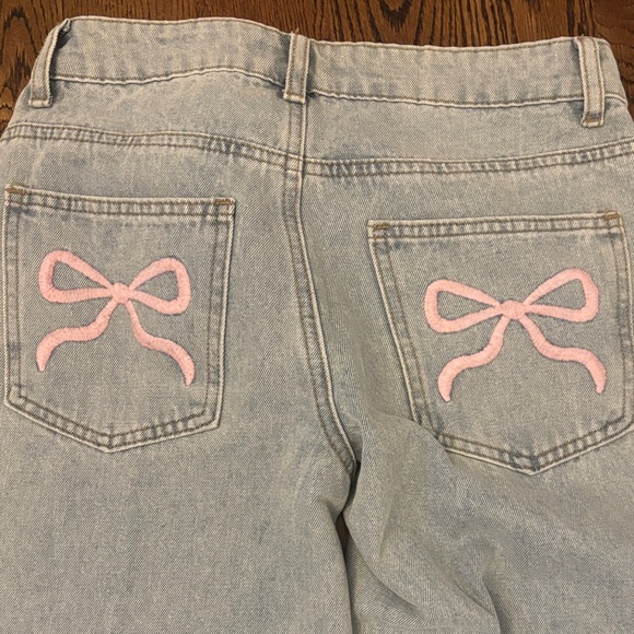 Edikted XS Light Blue Flare Jeans with Pink Bow Detail - Picture 2 of 5